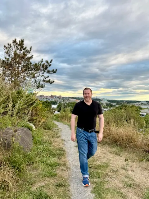 Therapist and client walking together outdoors